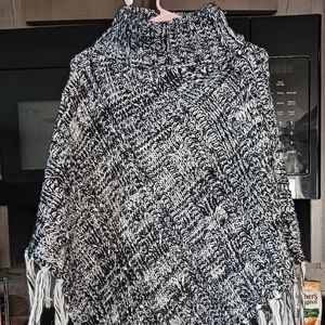 NWT knitted poncho, one size fits all. Never worn